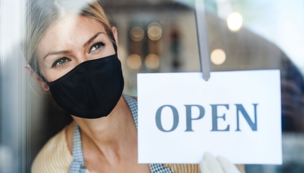 Coffee,Shop,Woman,Owner,With,Face,Mask,,Open,After,Lockdown